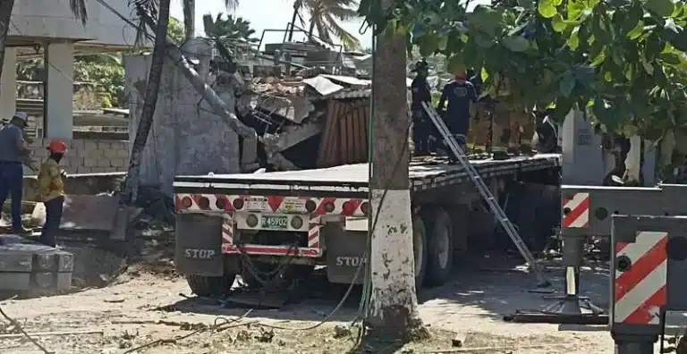 Tractor-trailer slams into wall of Hotel Pradomar